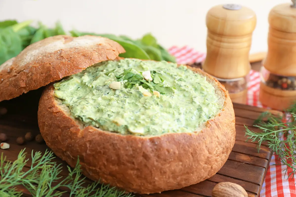 Friends enjoying Knorr spinach dip at a party, highlighting the dip's social appeal.